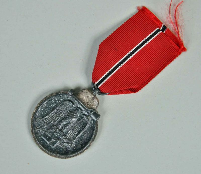 Regimentals GERMAN WWII RUSSIAN FRONT MEDAL MARKED 18 TO RING