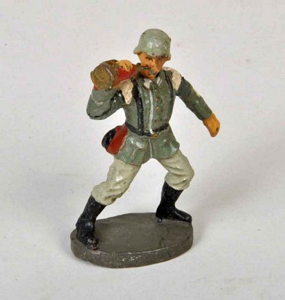 GERMAN WWII ELASTOLIN BUGLER.