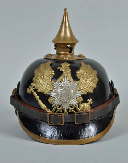 GERMAN WWI PRUSSIAN BATTLE DAMAGED OLDENBURG REGIMENT PICKELHAUBE.