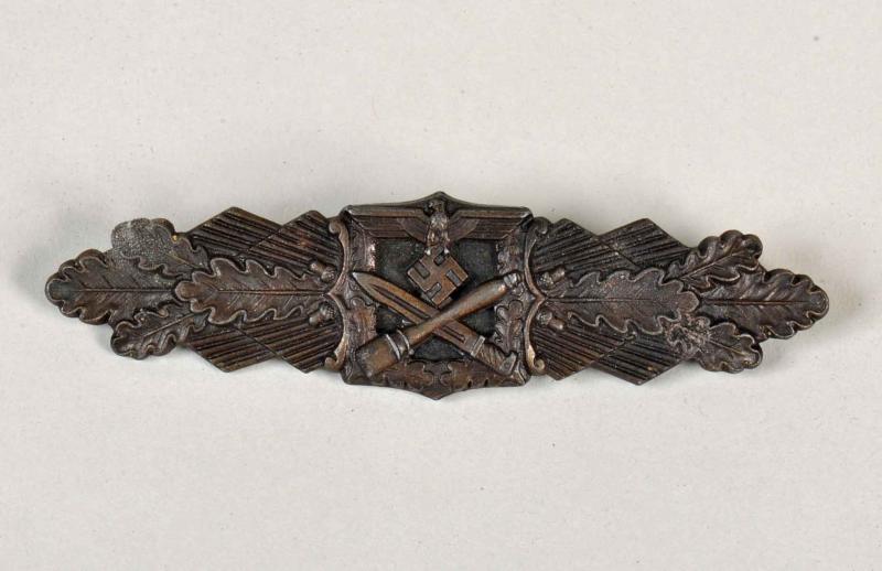 GERMAN WWII CLOSE COMBAT BAR IN BRONZE BY C.E.JUNCKER.