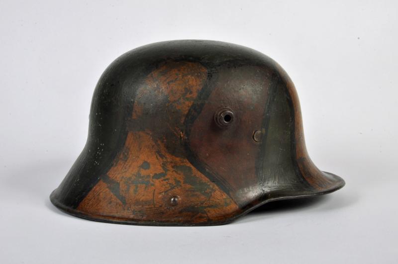 GERMAN WWI M.17 CAMOUFLAGE COMBAT HELMET.