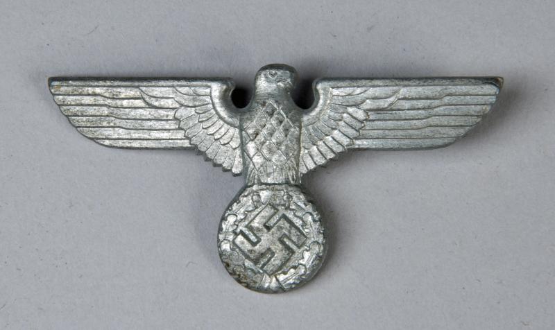 GERMAN WWII POLITICAL KEPI EAGLE IN WHITE METAL.