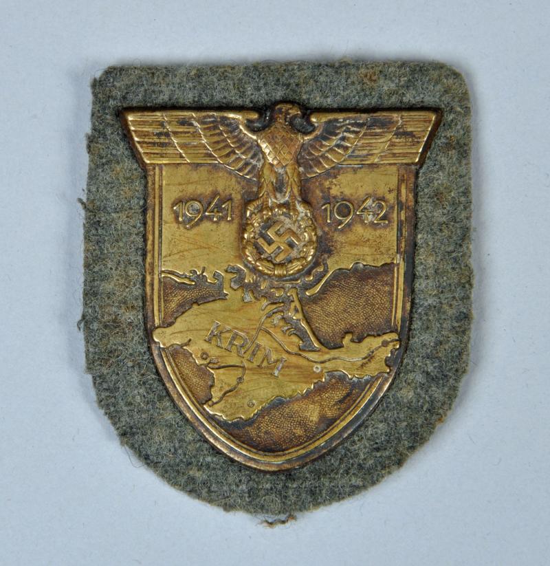 GERMAN WWII KRIM SHIELD WITH ARMY BACKING.