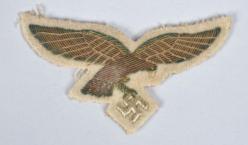 GERMAN WWII LUFTWAFFE GENERAL’S WHITE TUNIC EAGLE.
