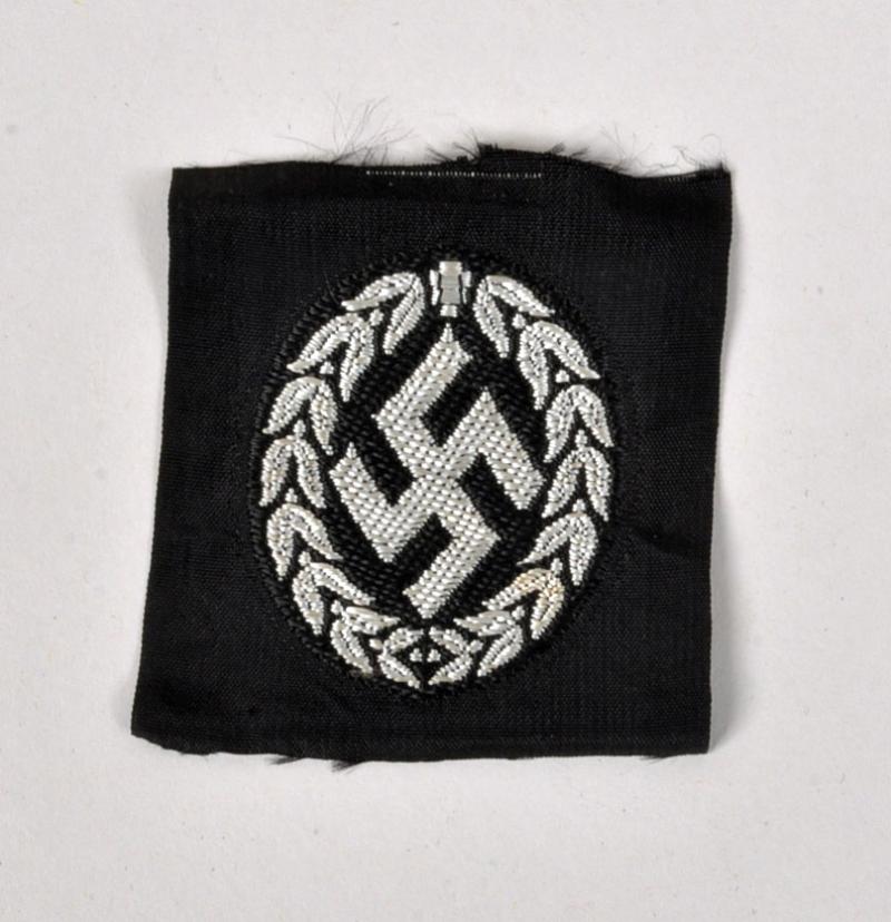 GERMAN WWII UKRAINIAN SCHUTZMANNSCHAFT CAP INSIGNIA,