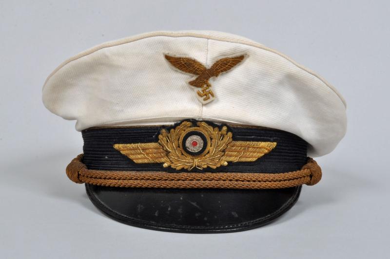 GERMAN WWII LUFTWAFFE GENERAL’S WHITE TOP VISOR CAP.