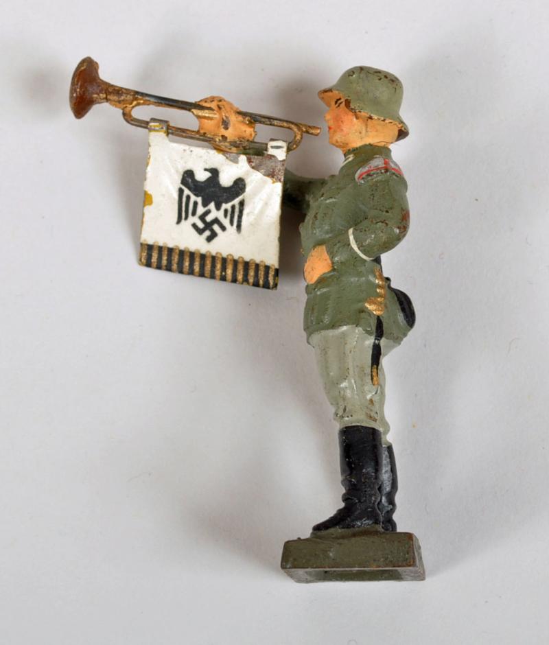 GERMAN WWII ELASTOLIN TRUMPET FIGURE.