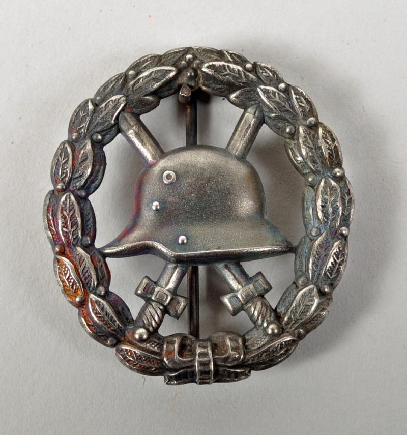GERMAN WWI WOUND BADGE IN SILVER, FRETTED TYPE.