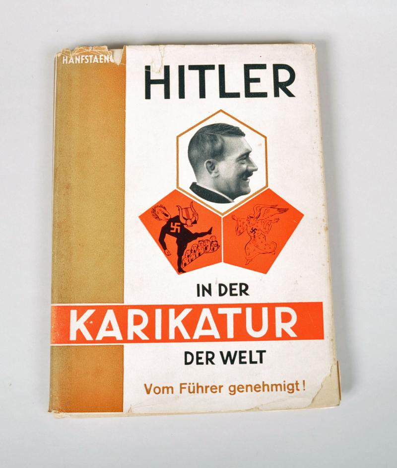 GERMAN WWII HITLER IN CARICATURE BOOK.