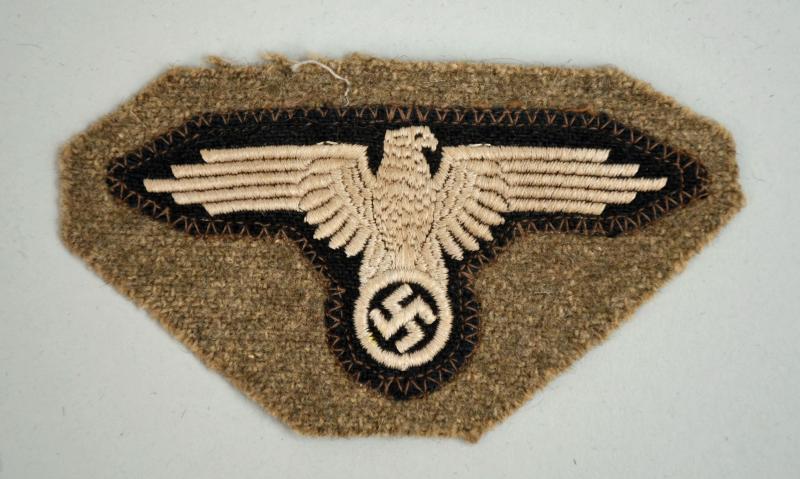 GERMAN WWII SS ARM EAGLE, CUT OFF.