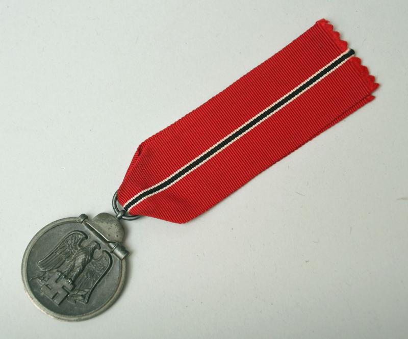 GERMAN WWII EAST FRONT MEDAL, NUMBERED ‘4’.