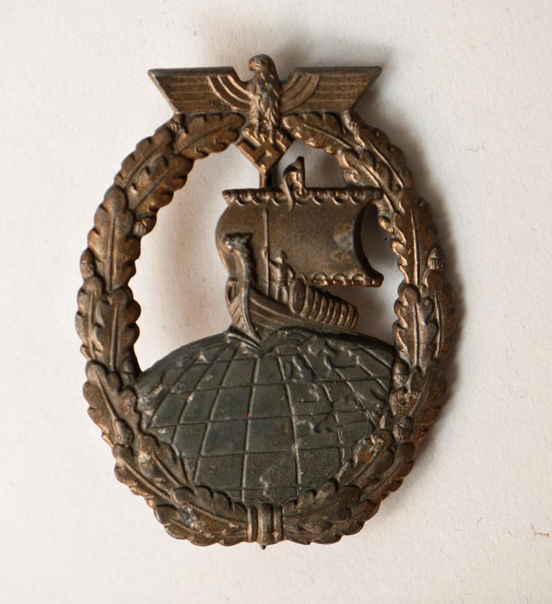 GERMAN WWII AUXILIARY CRUISER BADGE.