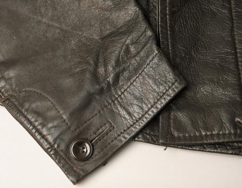 GERMAN WWII LEATHER PANZER/MARINE WRAP OVER JACKET.