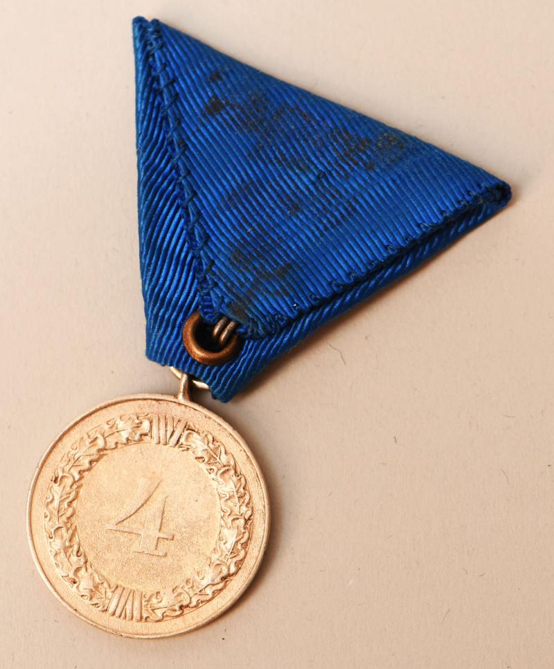 GERMAN WWII ARMED FORCES LONG SERVICE MEDAL.