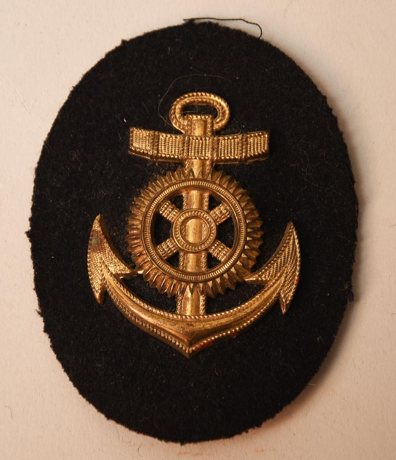 GERMAN WWII KRIEGSMARINE ENGINE PERSONNEL TRADE PATCH IN METAL AND CLOTH.