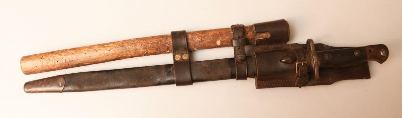 BRITISH WWI 1907 SWORD BAYONET WITH 1914 FROG AND LEATHER HELVE STICK HOLDER.