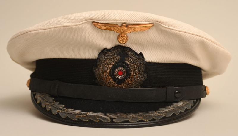GERMAN WWII KRIEGSMARINE WHITE TOP CAPTAIN AND ABOVE VISOR CAP.
