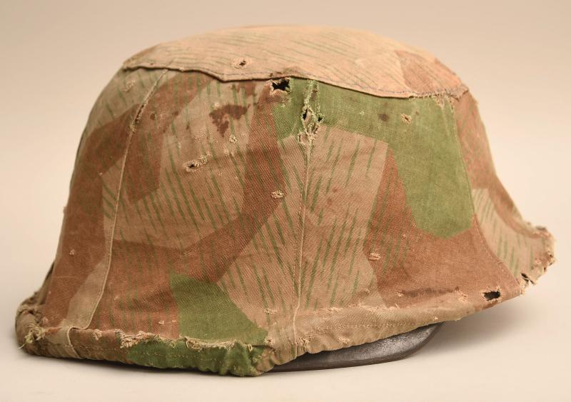 GERMAN WWII HELMET COVER.