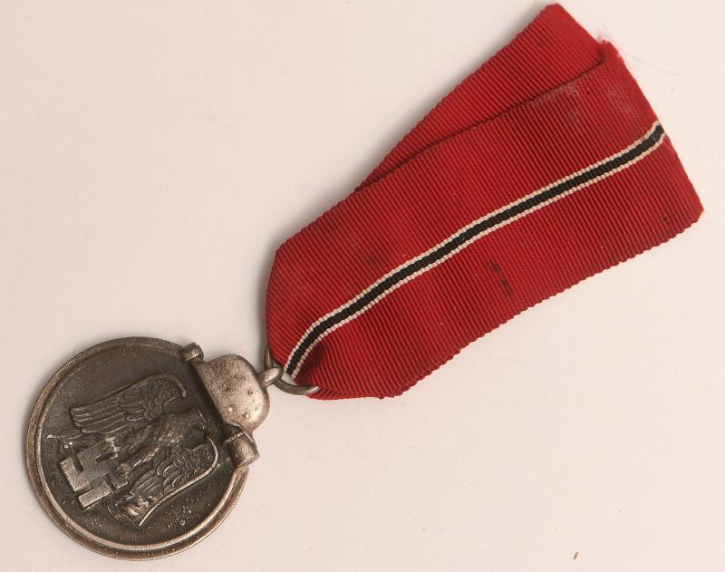 GERMAN WWII EASTERN FRONT MEDAL WITH RIBBON.