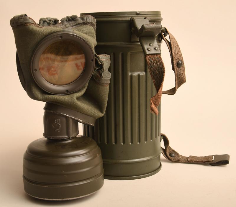 GERMAN WWII ARMED FORCES GAS MASK SET.