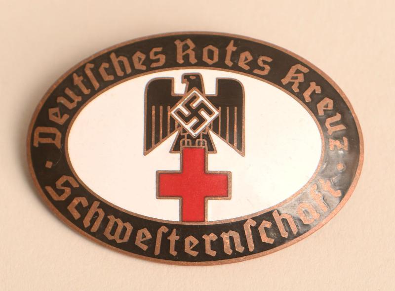 GERMAN WWII OVAL VERSION OF THE RED CROSS MEMBERSHIP BROOCH.