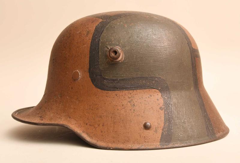 GERMAN WWI M17 CAMOUFLAGE TRENCH HELMET.