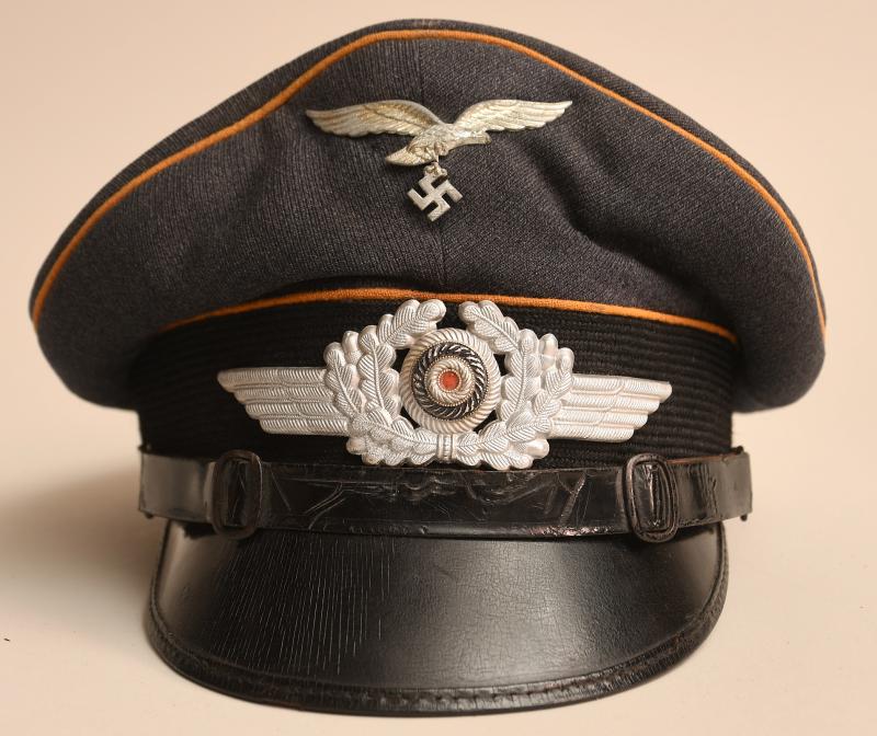 GERMAN WWII LUFTWAFFE NCO OR MAN’S VISOR CAP OF THE RESERVE.