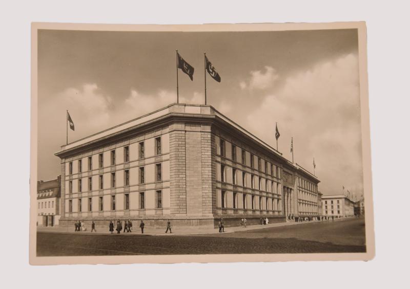 GERMAN WWII STREET CORNER VIEW OF THE BERLIN RIECH CHANCELLORY WITH FLAGS.