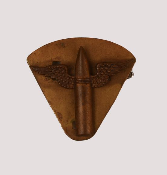 BRITISH WWII RAF WINGED BULLET BADGE WITH BACK PLATE.