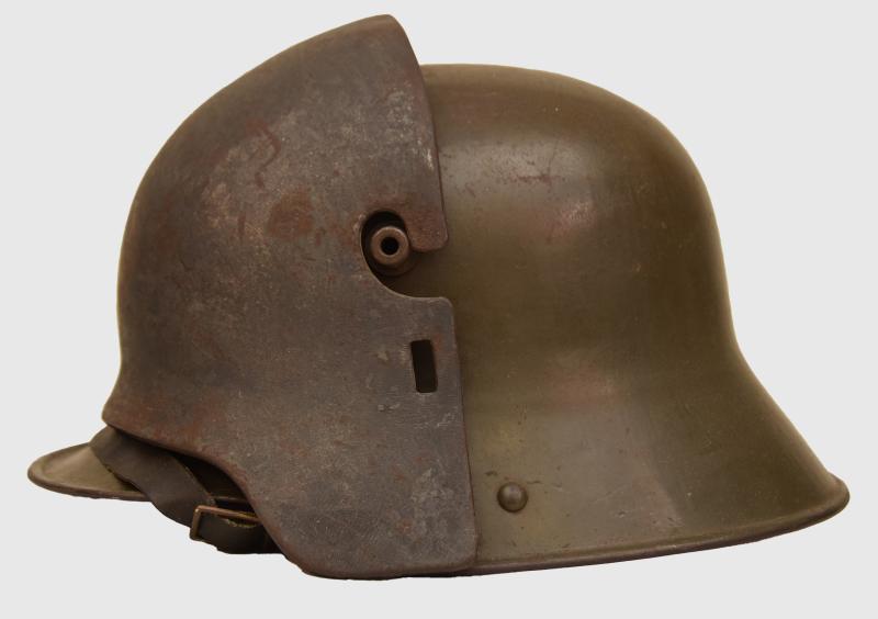 GERMAN WWI M.16 TRENCH HELMET WITH ARMOURED FRONT PLATE.