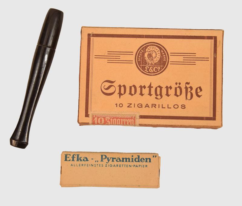 GERMAN WWII THIRD REICH TAX PAID CIGARS, CIGARETTE PAPER AND CIGARETTE HOLDER.