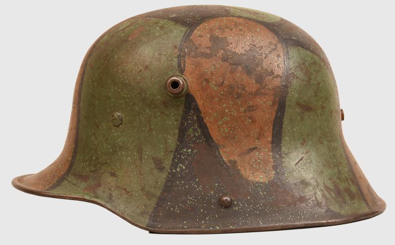 GERMAN WWI CAMOUFLAGE M17 TRENCH HELMET.