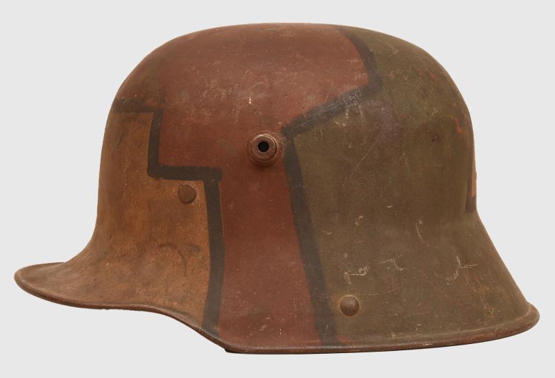 GERMAN WWI M16 CAMOUFLAGE TRENCH HELMET.