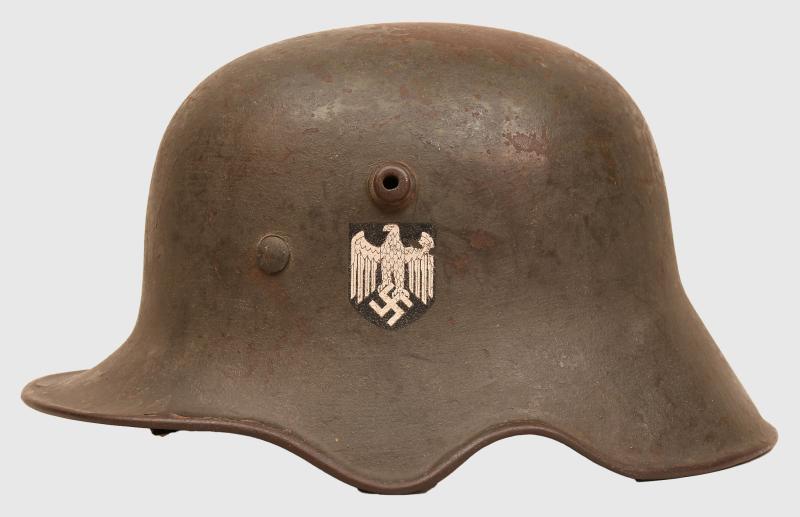 GERMAN WWII M18 SINGLE DECAL EAR CUT OUT COMBAT HELMET.