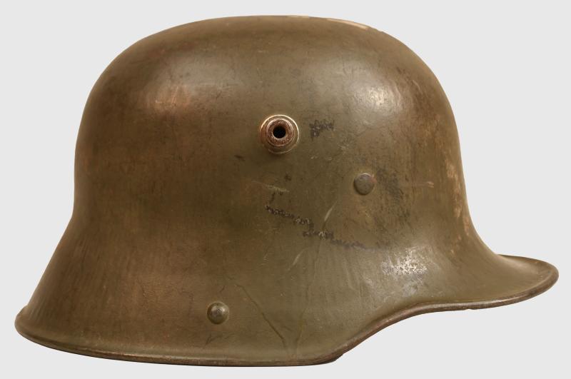 GERMAN WWI M17 HELMET WITH REMAINS OF POST HOME LABEL.