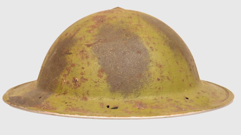 BRITISH WWII CAMOUFLAGE HELMET.