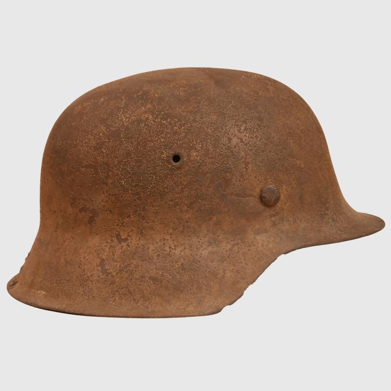 GERMAN WWII M.42 CAMOUFLAGE COMBAT HELMET.