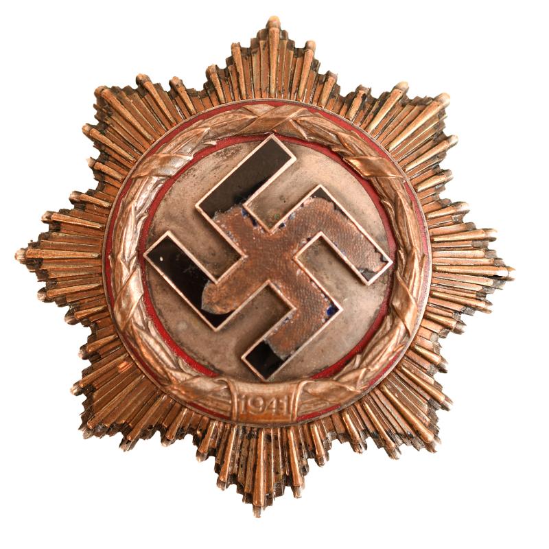 GERMAN WWII GERMAN CROSS IN GOLD, BATTLE WORN.