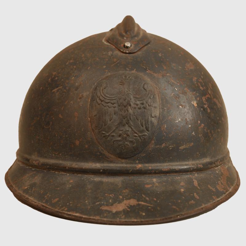 POLISH WWI ADRIAN HELMET WITH LARGE OVAL POLISH EAGLE BADGE.