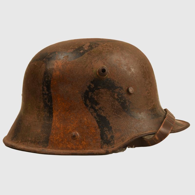 GERMAN WWI M.16 CAMOUFLAGE HELMET.