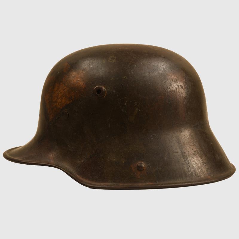 GERMAN WWI M17 CAMOUFLAGE COMBAT HELMET.