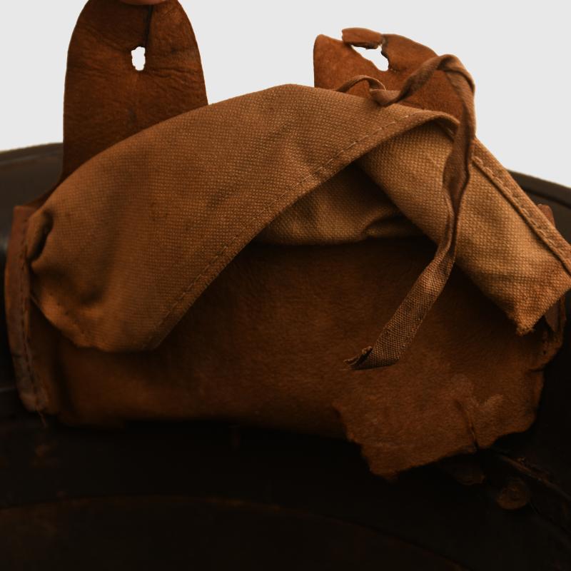 GERMAN WWI M17 CAMOUFLAGE COMBAT HELMET.