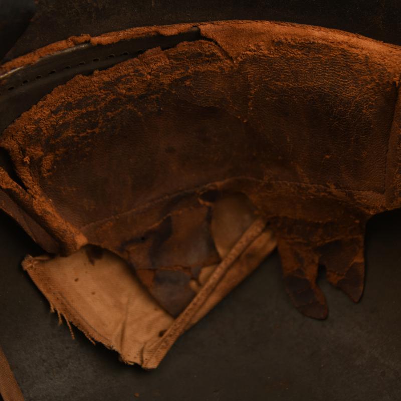 GERMAN WWI M17 CAMOUFLAGE COMBAT HELMET.