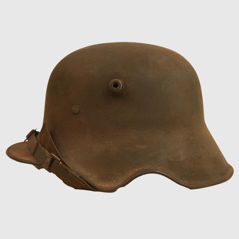 GERMAN WWI M18 EAR CUT OUT HELMET.