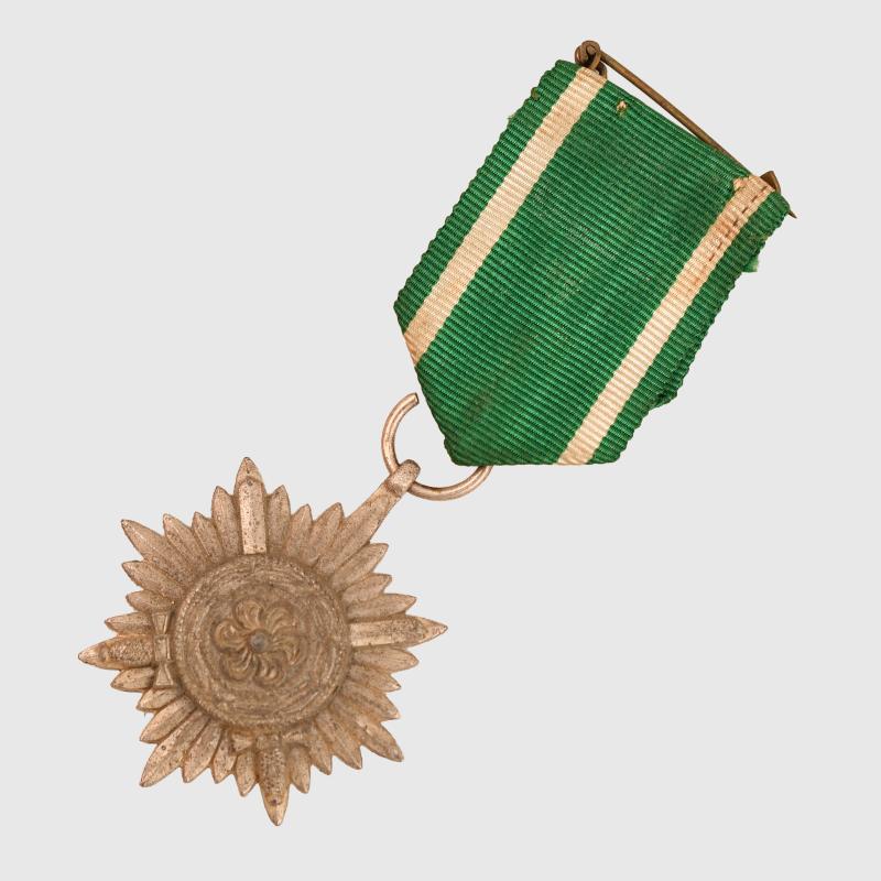 GERMAN WWII EASTERN PEOPLE’S AWARD 2ND CLASS IN SILVER WITH SWORDS.