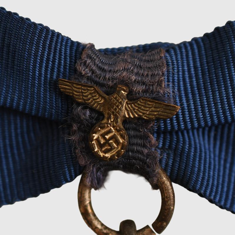 GERMAN WWII RAD 18 YEAR LONG SERVICE MEDAL WITH FEMALE WRAP.