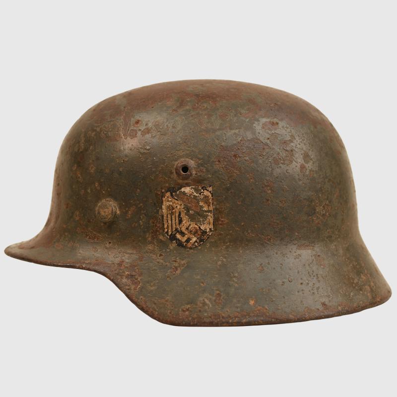 GERMAN WWII ARMY DOUBLE DECAL COMBAT HELMET WITHOUT ITS LINER.