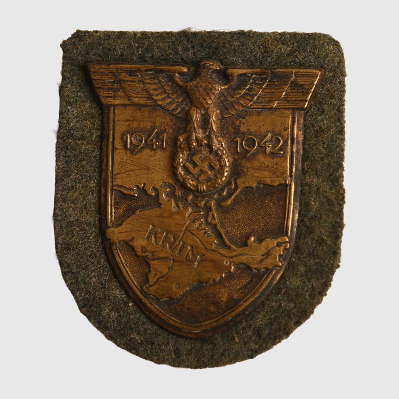 GERMAN WWII KRIM SHIELD WITH ARMY BACKING.