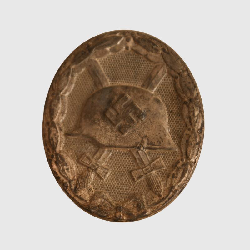GERMAN WWII WOUND BADGE IN SILVER. MARKED 107