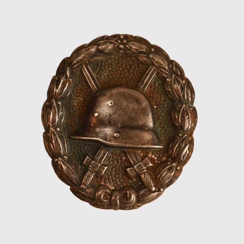 GERMAN WWI WOUND BADGE IN SILVER WITH DISC BACK.